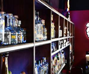 Several bottles of liquer behind the bar